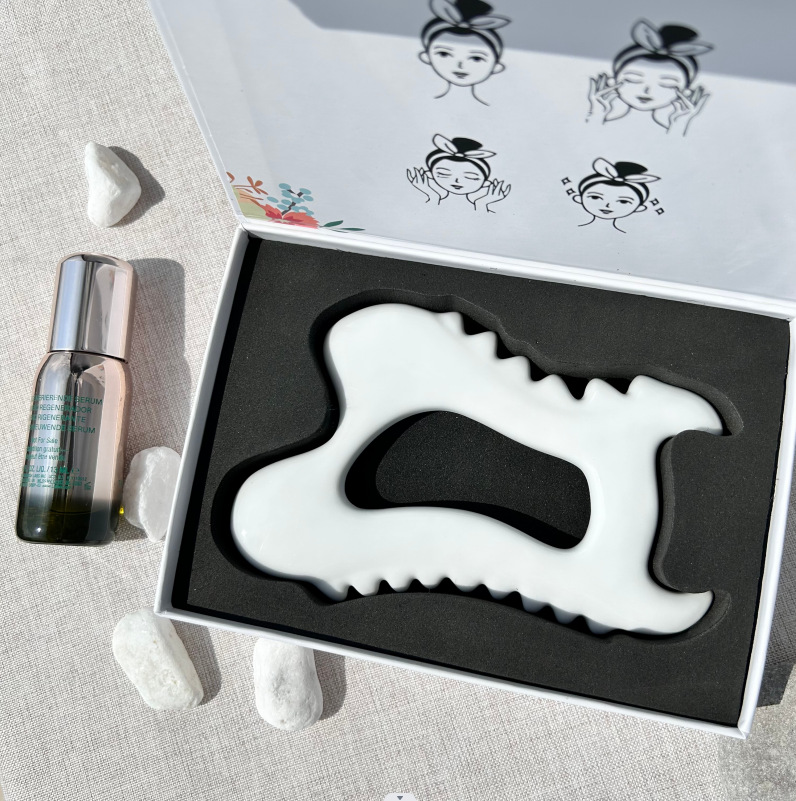 Ceramic Gua Sha massage tools in assorted shapes