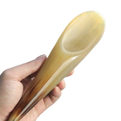 Large horn Gua Sha massage tube on clean background