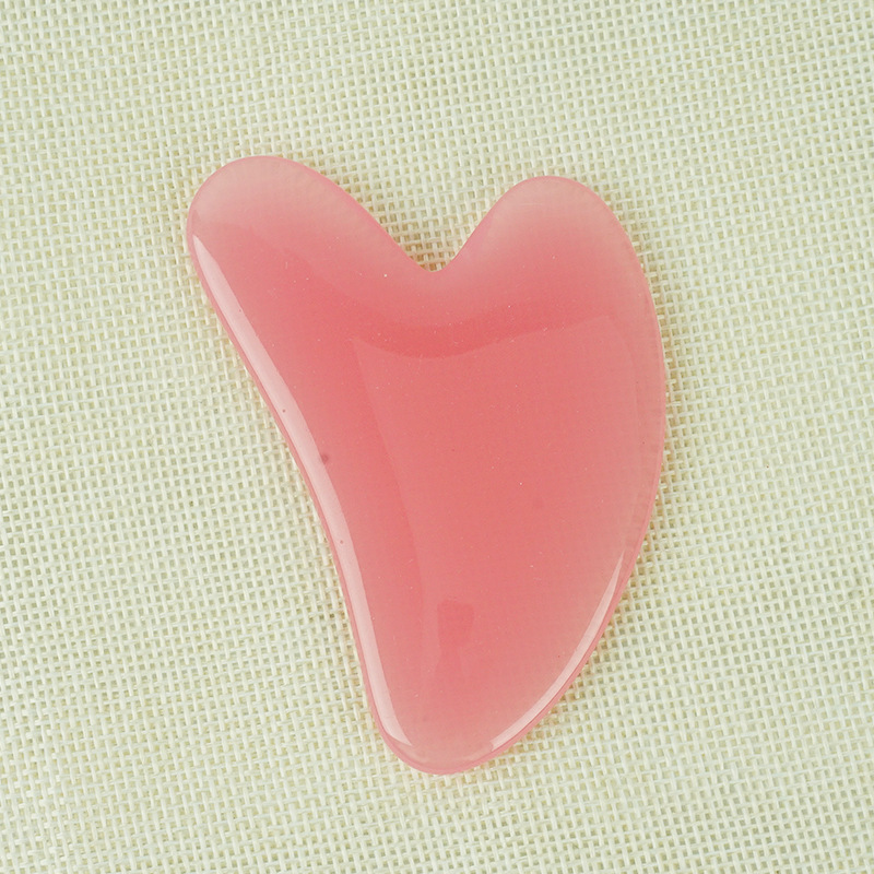 Pink resin Gua Sha tool